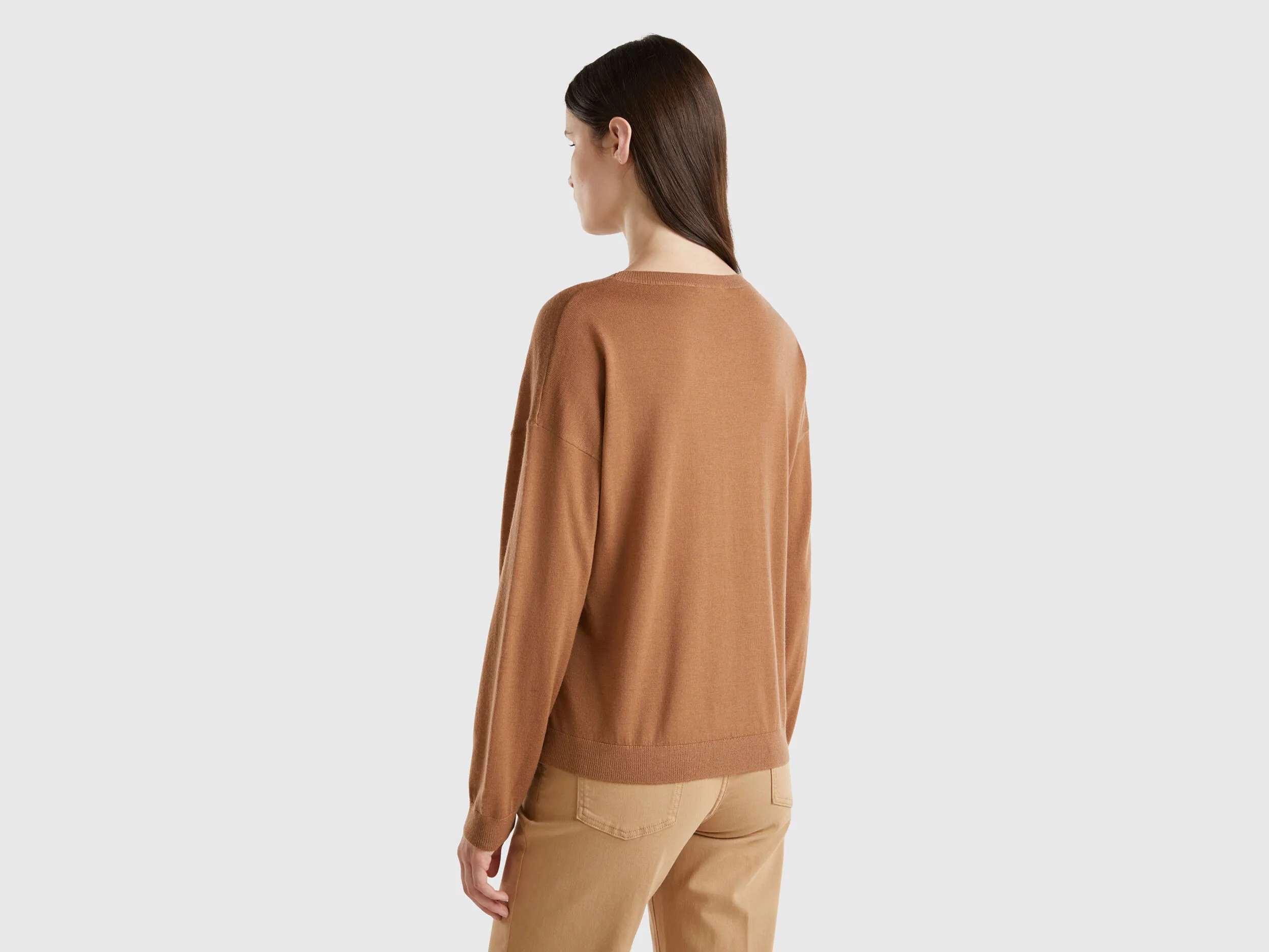 Boat neck sweater in pure Merino wool - Camel | Benetton